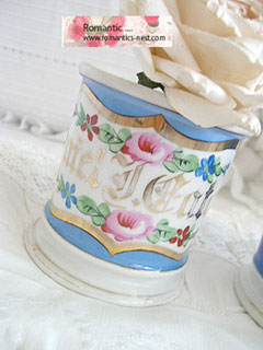 ANTIQUE BLUE GOLD AND FLORAL CUP...1